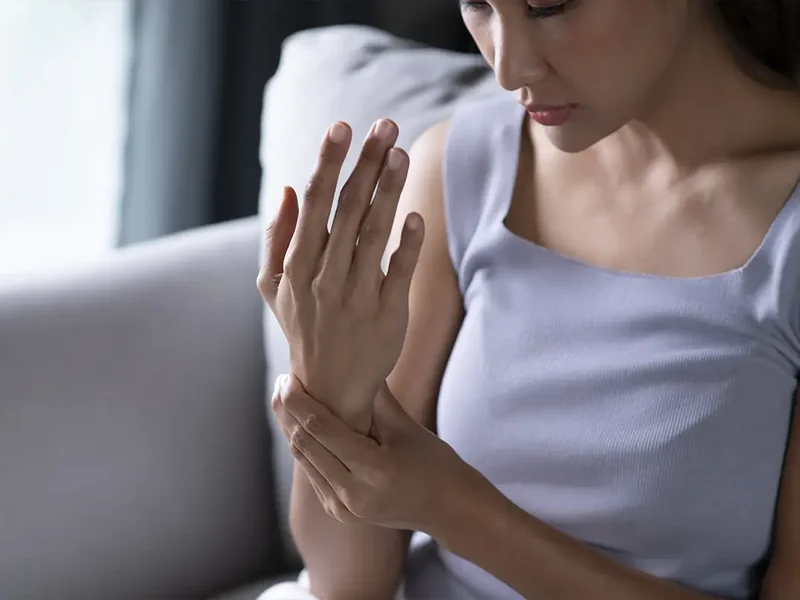 Physical therapist assessing a patient's nerve mobility and movement